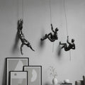 Climbing Figure Resin Wall Sculpture