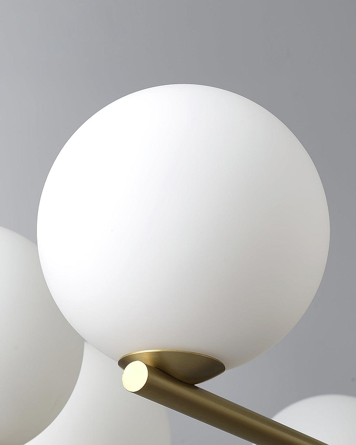 Angular Brass Arm Glass Globe Chandelier