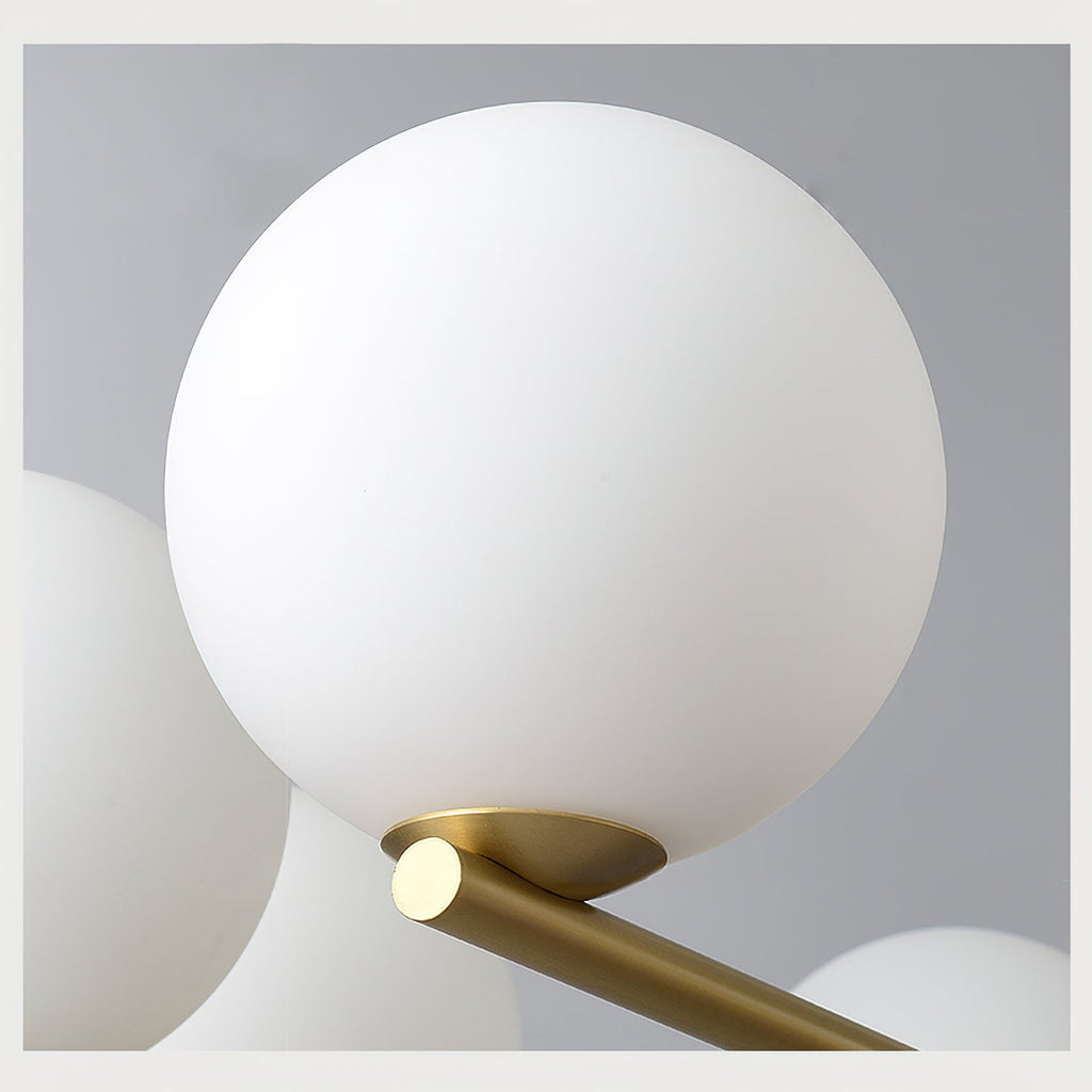 Angular Brass Arm Glass Globe Chandelier