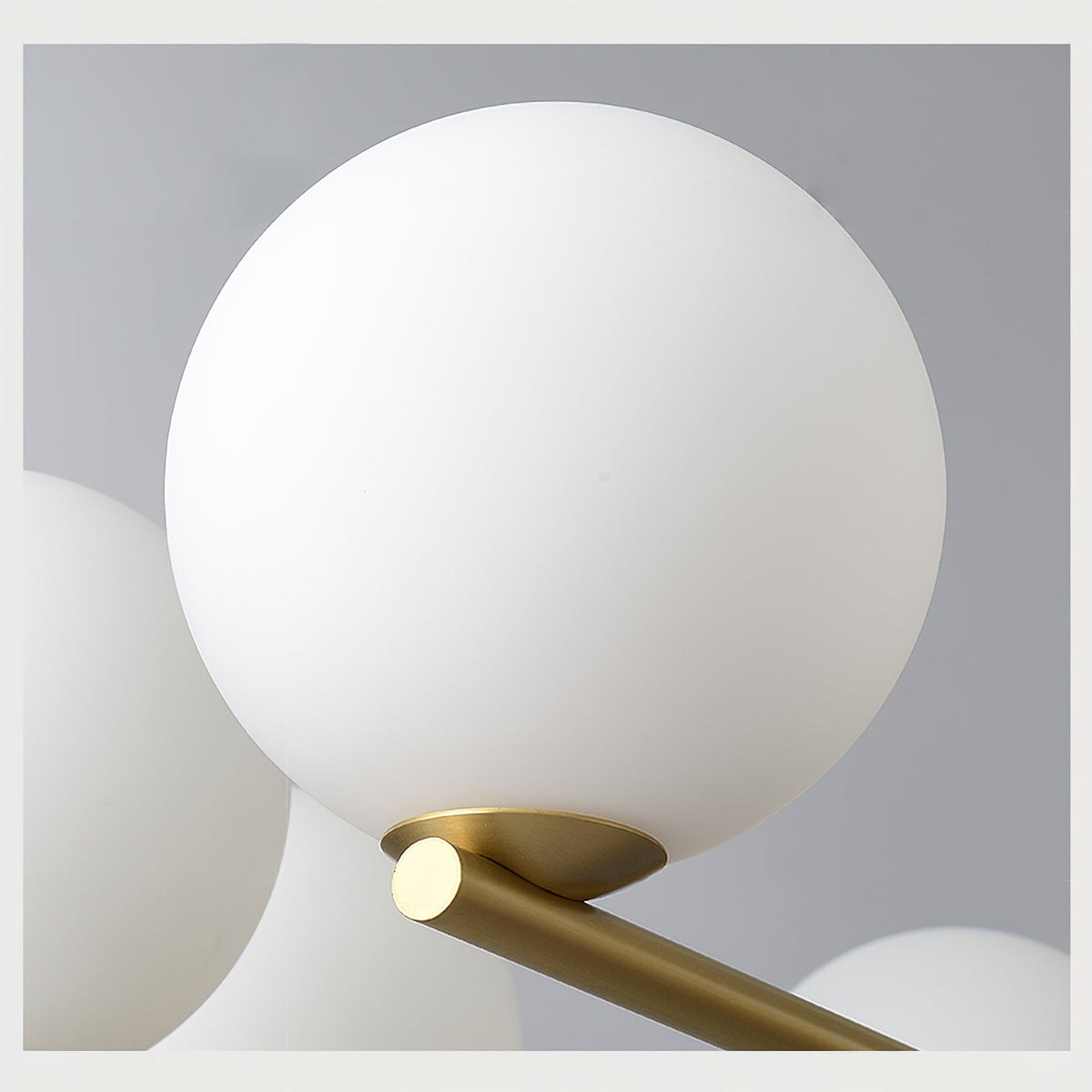 Angular Brass Arm Glass Globe Chandelier