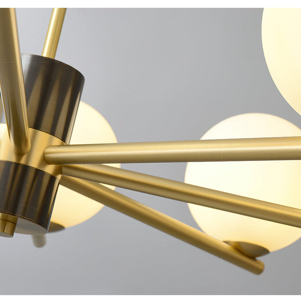Angular Brass Arm Glass Globe Chandelier