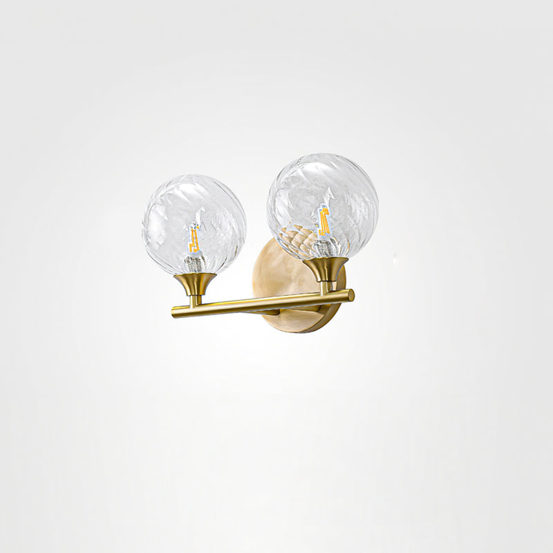 Ribbed Clear Glass Globe Brass Wall Light