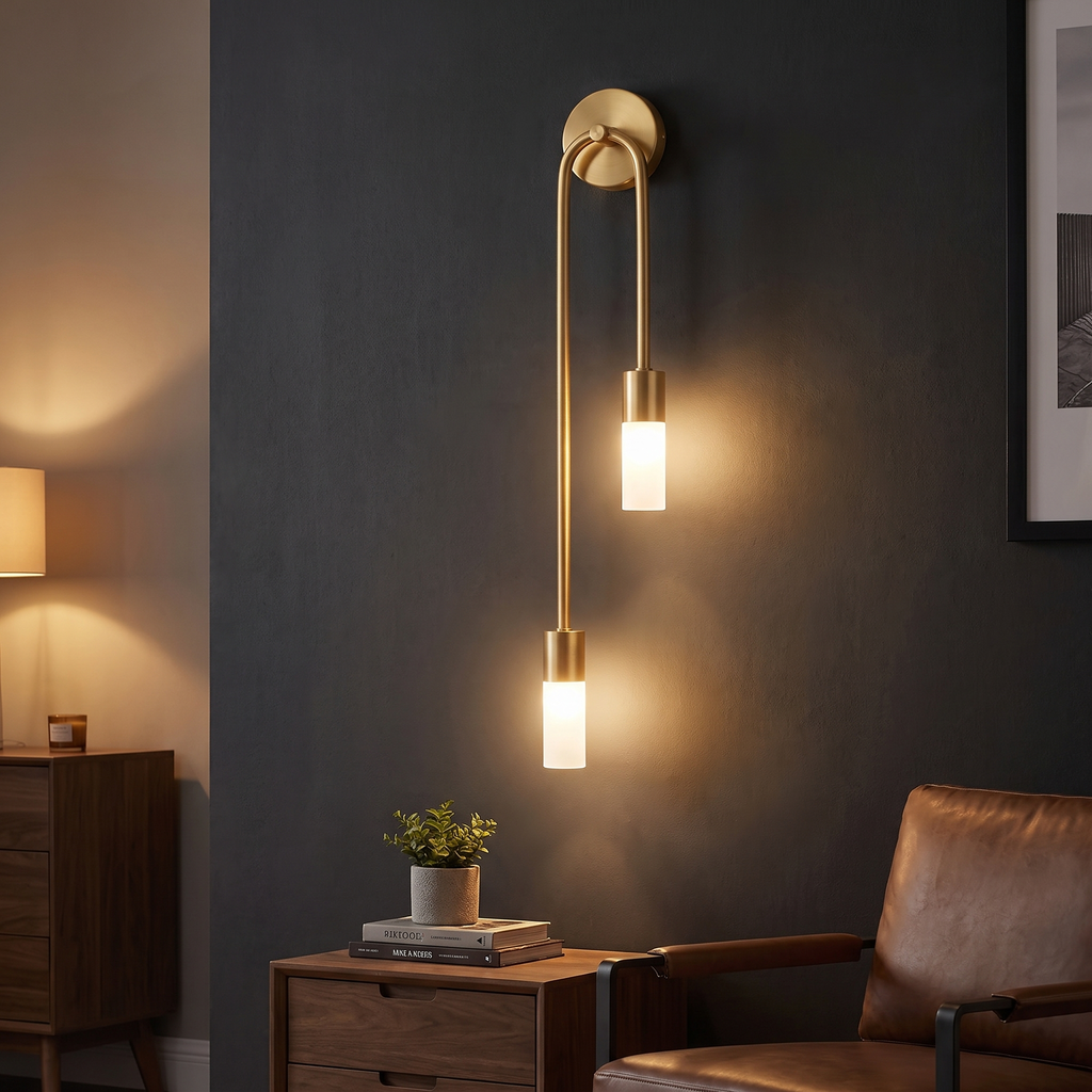 Gold twin-glow sconce lit in a living room