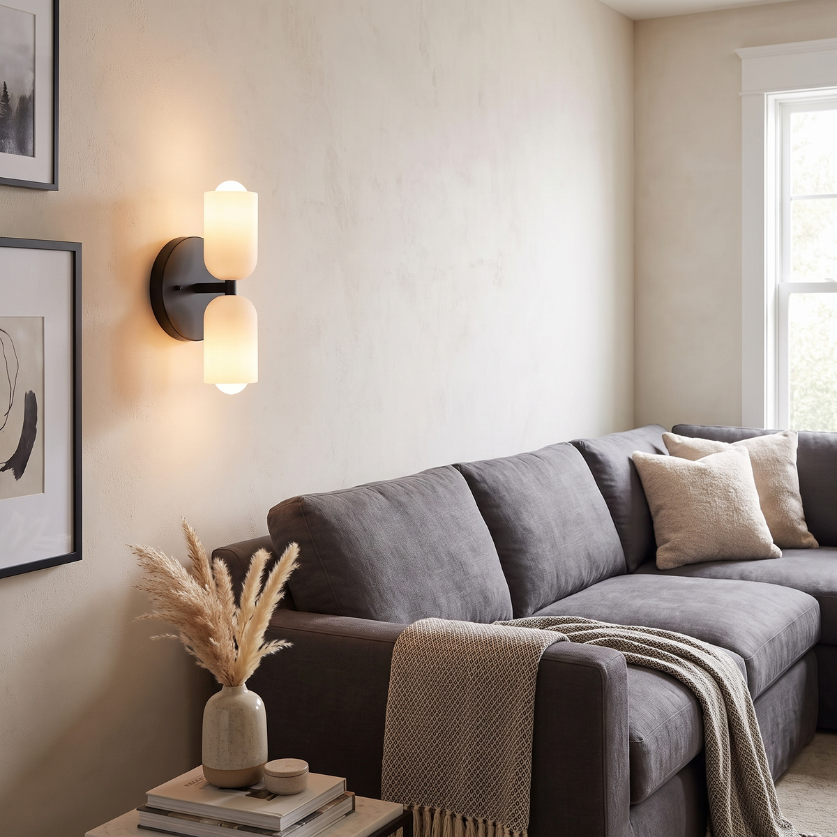 Double sconce beside a sofa