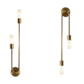 Gold twin-glow bedside wall sconce