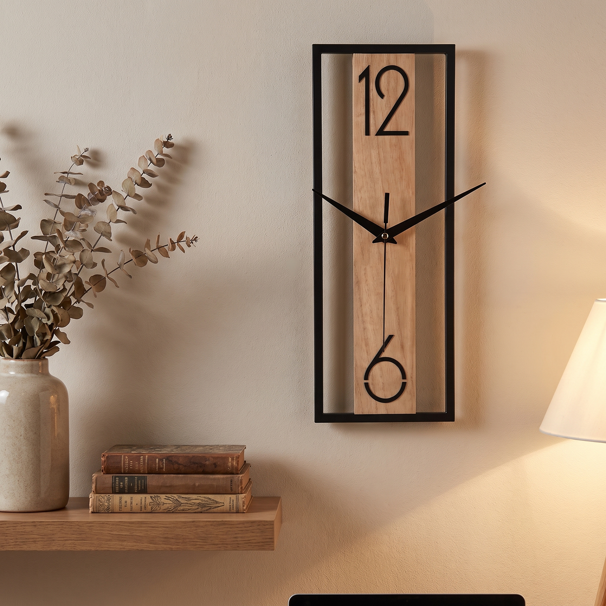 Slim Vertical Open-Frame Wall Clock styled at home
